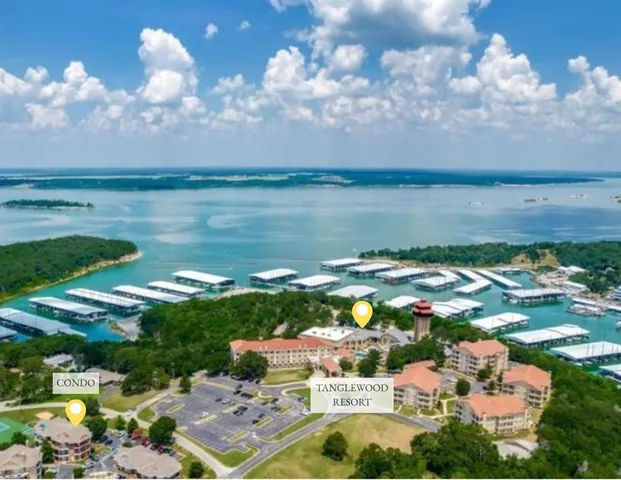 a view of a swimming pool and a yard
