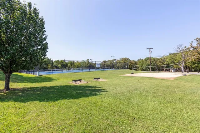 a view of a swimming pool with a lounge chairs