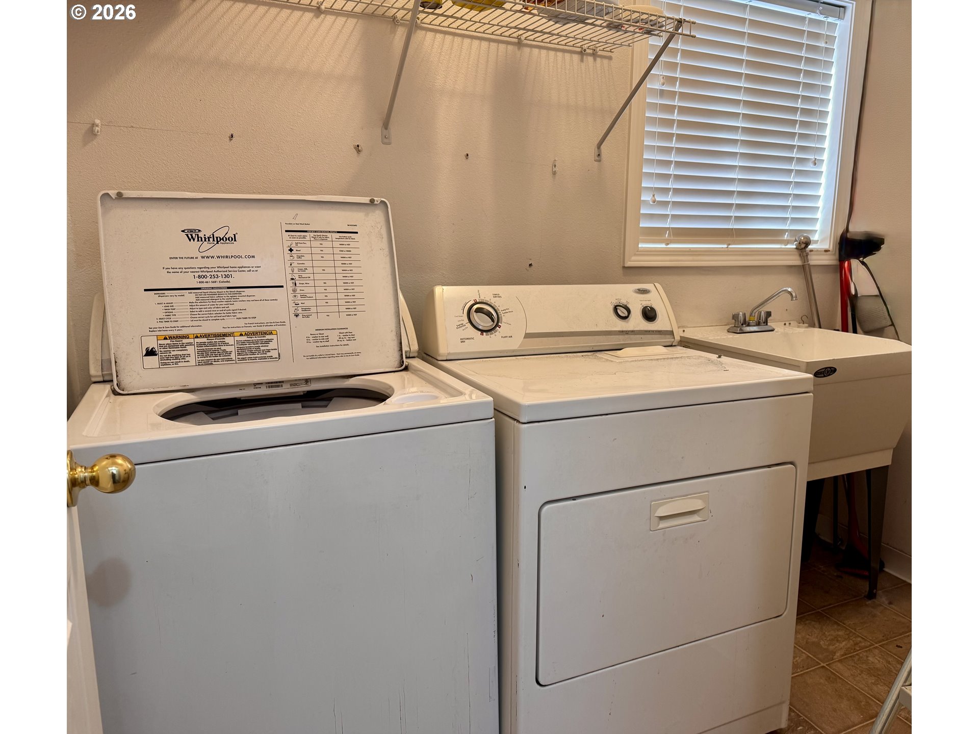 310 13th Street Lafayette, OR 97127 - Photo 18 of 22 a utility room with dryer and washer