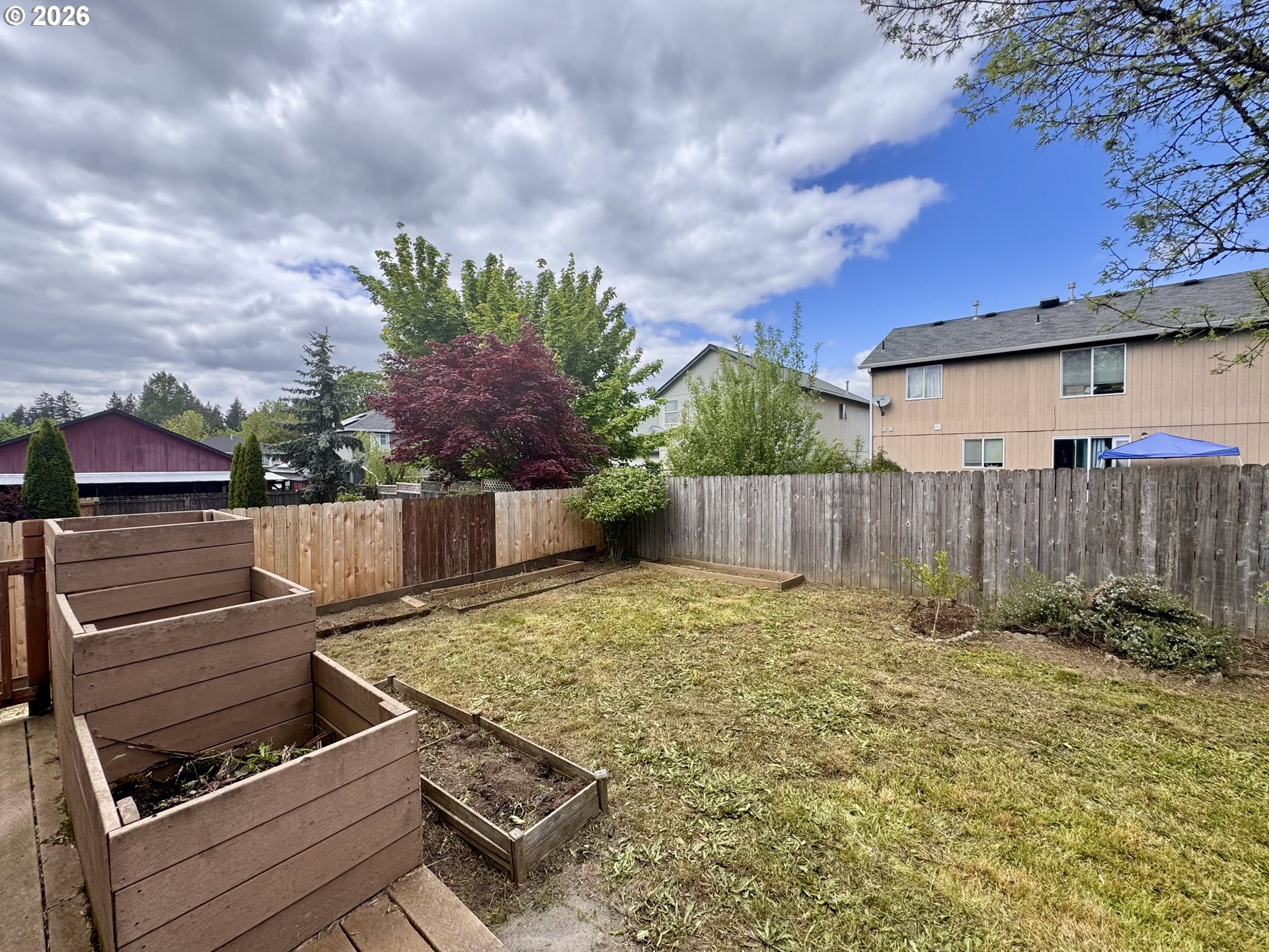 310 13th Street Lafayette, OR 97127 - Photo 21 of 22 a backyard of a house with lots of green space