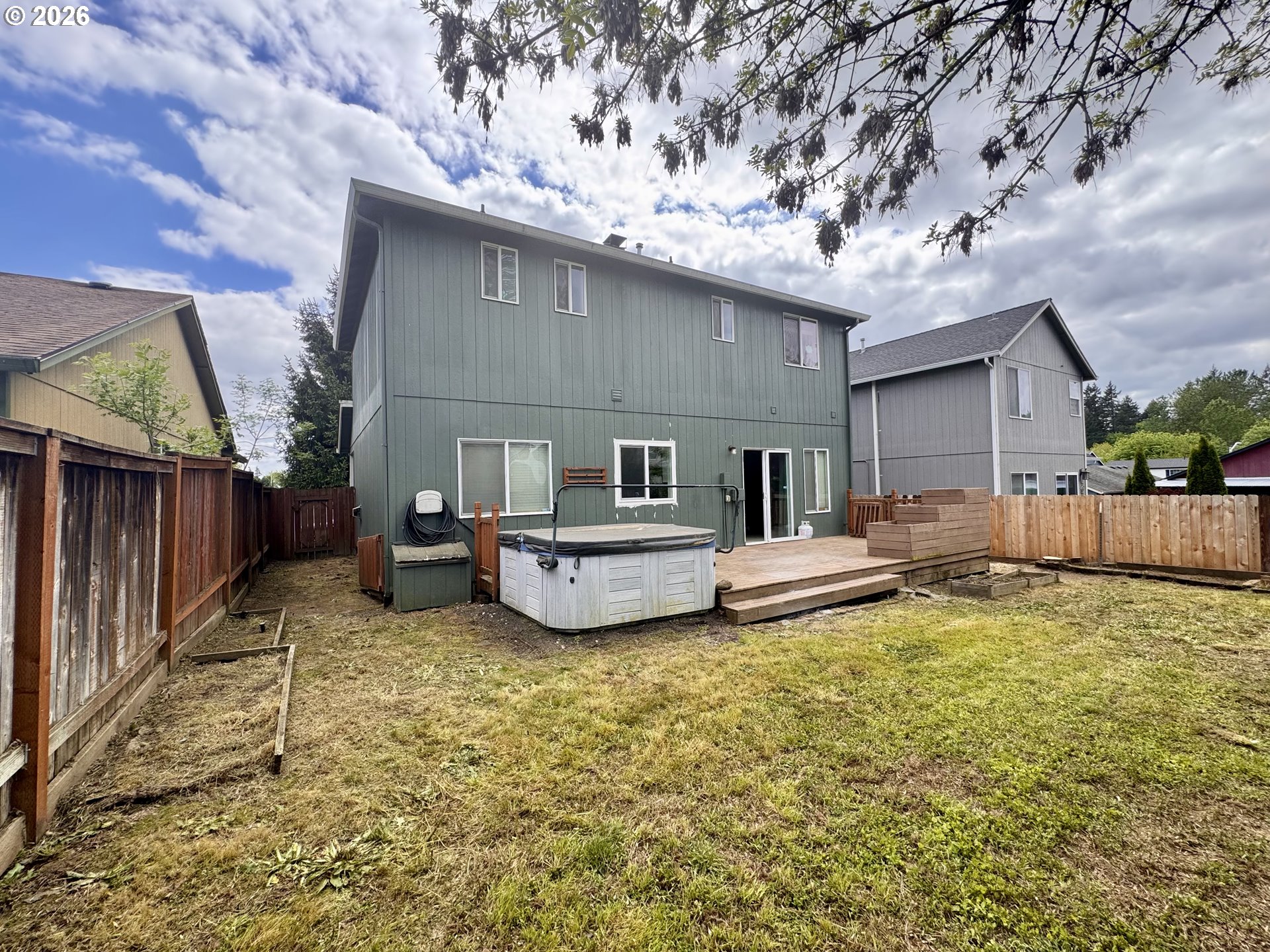 310 13th Street Lafayette, OR 97127 - Photo 22 of 22 a front view of a house with a garden and deck