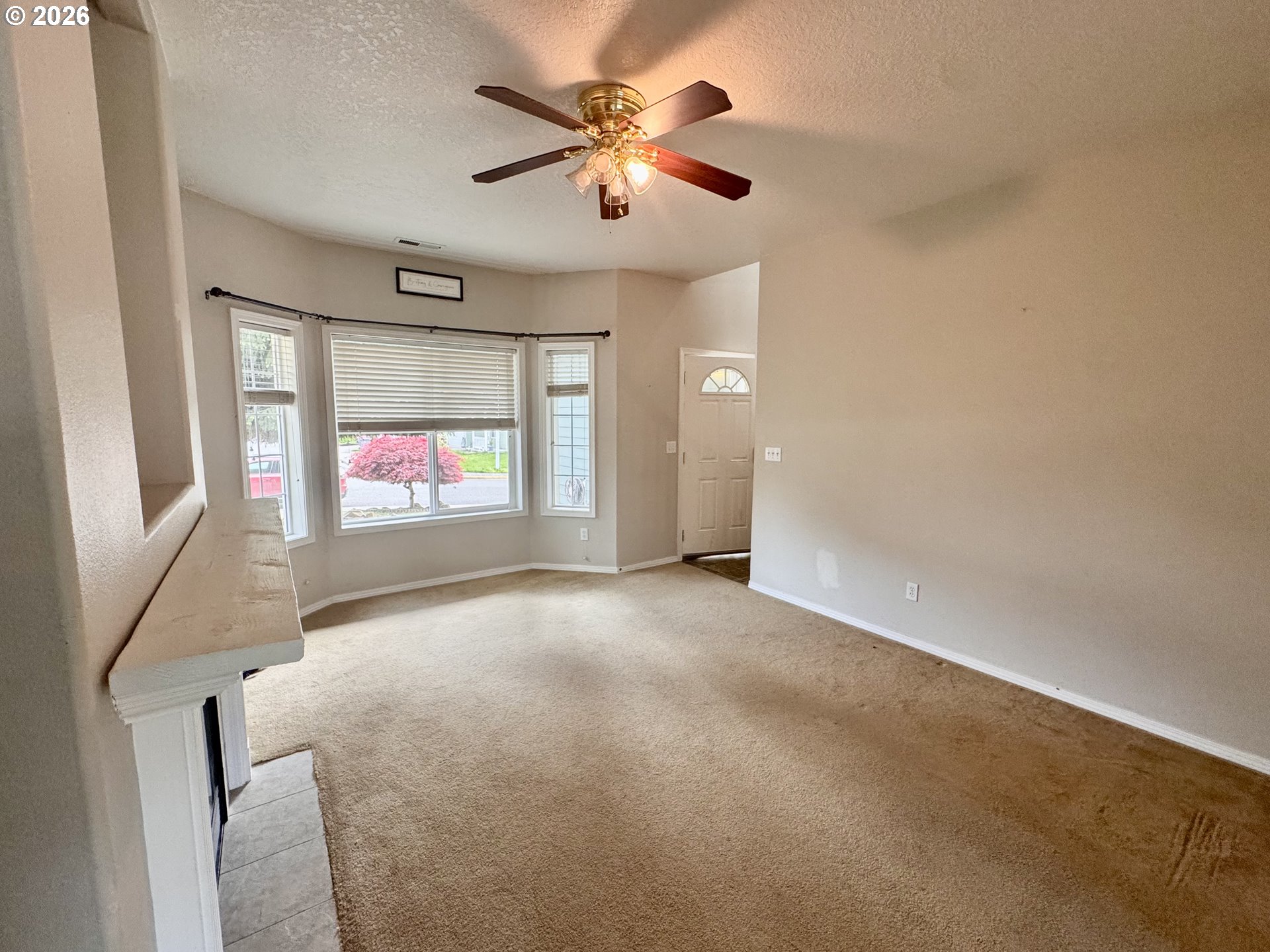 310 13th Street Lafayette, OR 97127 - Photo 7 of 22 a view of an empty room with a window
