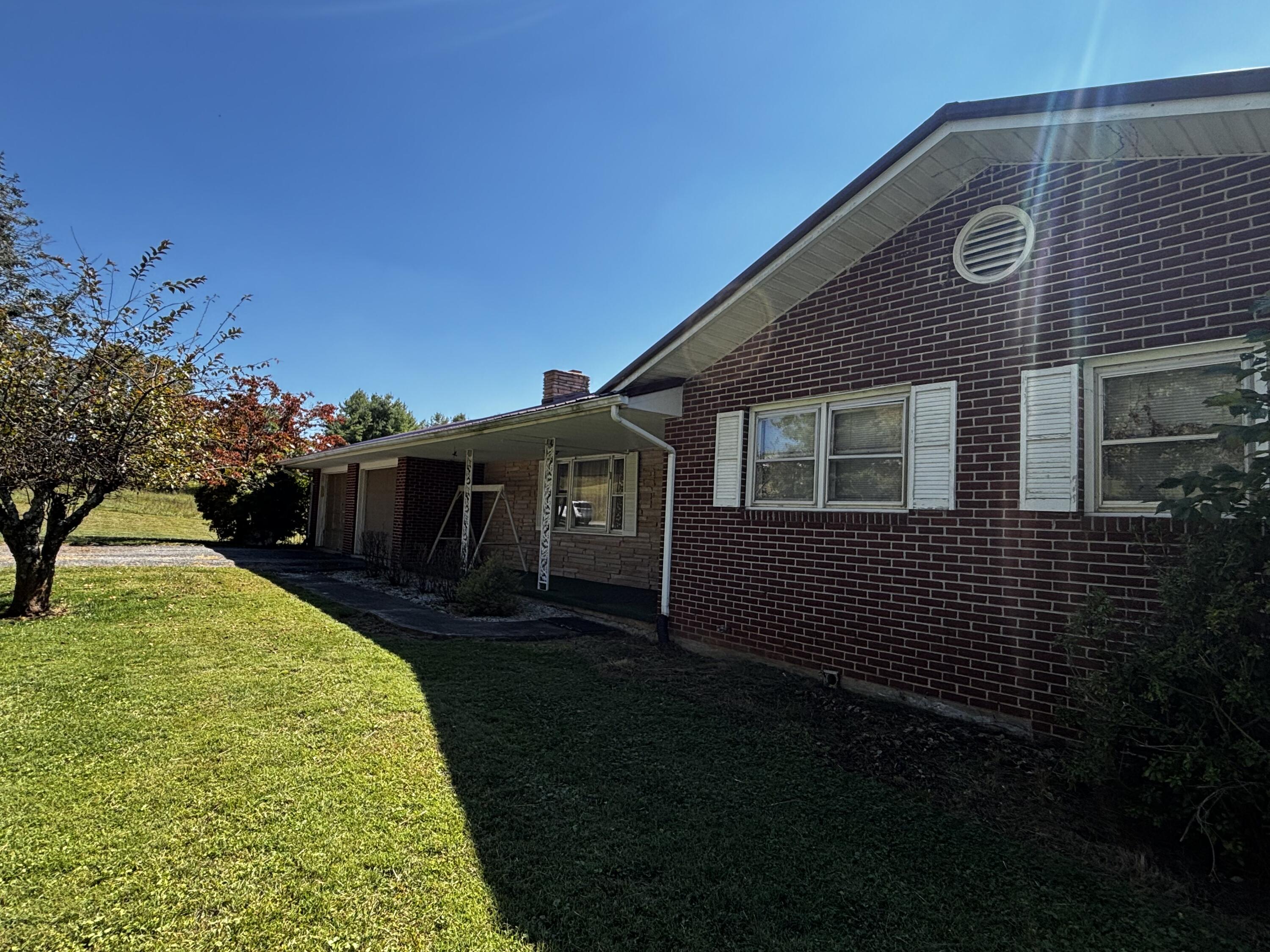 375 Barberry Road Southeast Floyd, VA 24091 - Photo 2 of 40 a front view of a house with a yard