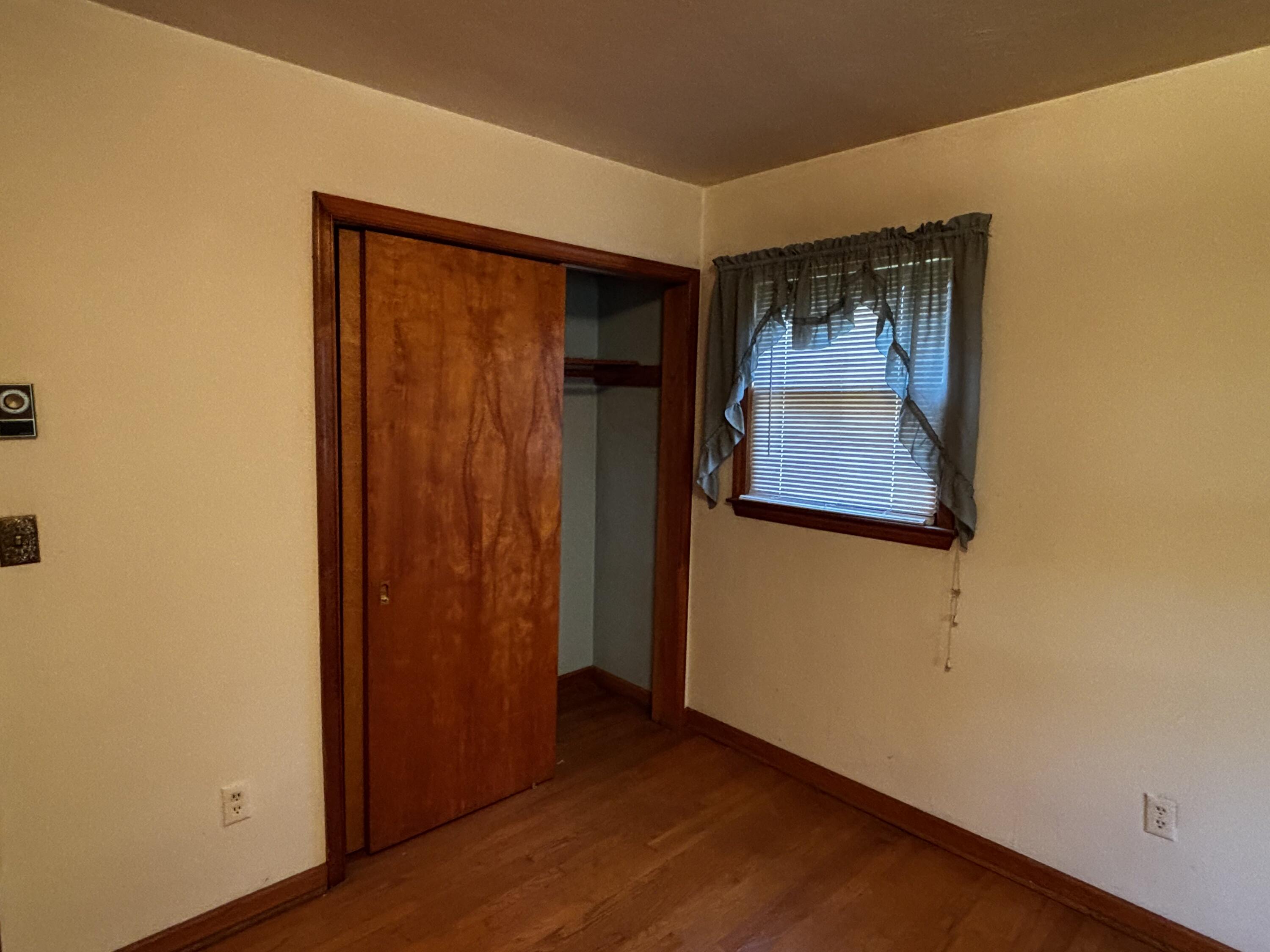 375 Barberry Road Southeast Floyd, VA 24091 - Photo 31 of 40 an empty room with wooden floor and windows