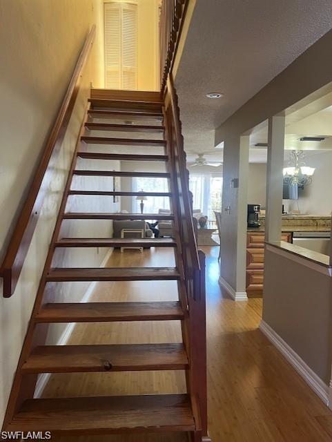 800 Meadowland Drive, Unit 252 Naples, FL 34108 - Photo 11 of 21 a view of entryway and hall with wooden floor