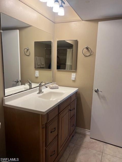800 Meadowland Drive, Unit 252 Naples, FL 34108 - Photo 17 of 21 a bathroom with a sink and a mirror