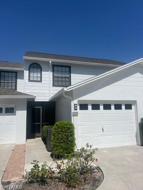 800 Meadowland Drive, Unit 252 Naples, FL 34108 - Photo 21 of 21 a front view of a house with garden