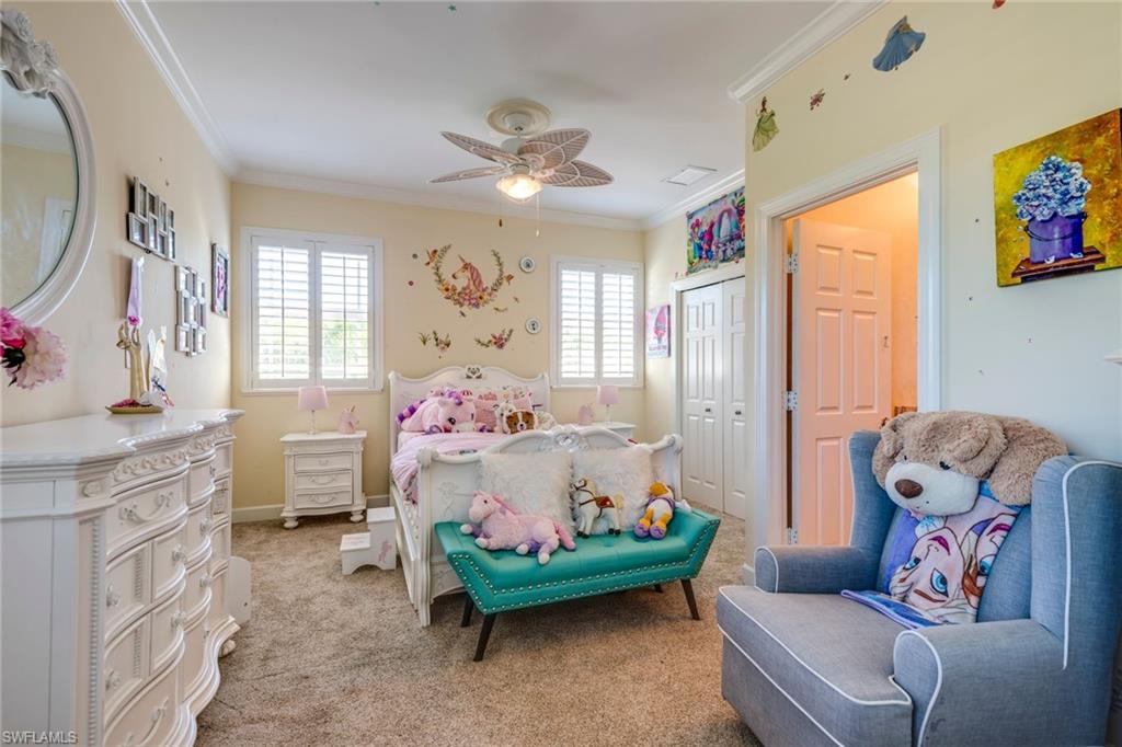 1672 Jewel Naples, FL 34102 - Photo 16 of 27 a bedroom with furniture and window