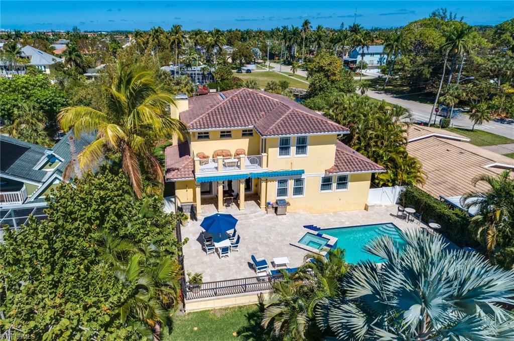 1672 Jewel Naples, FL 34102 - Photo 24 of 27 a view of a house with a yard