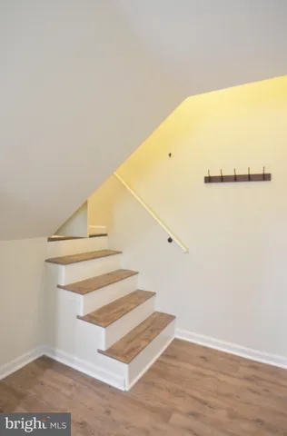 a bathroom with a bathtub and a toilet