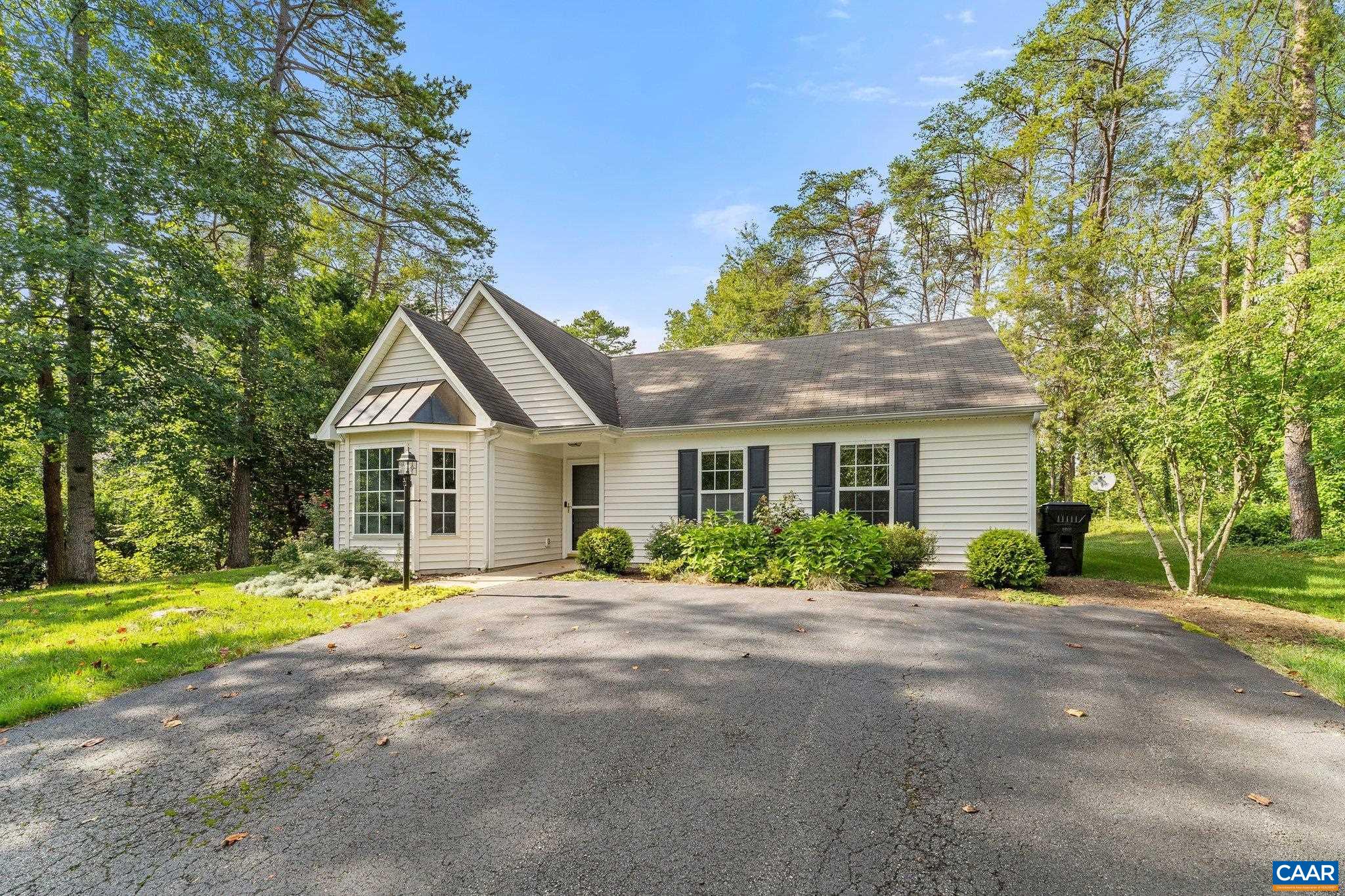 507 Northridge Road Ruckersville, VA 22968 - Photo 3 of 48 a front view of a house with a yard and trees