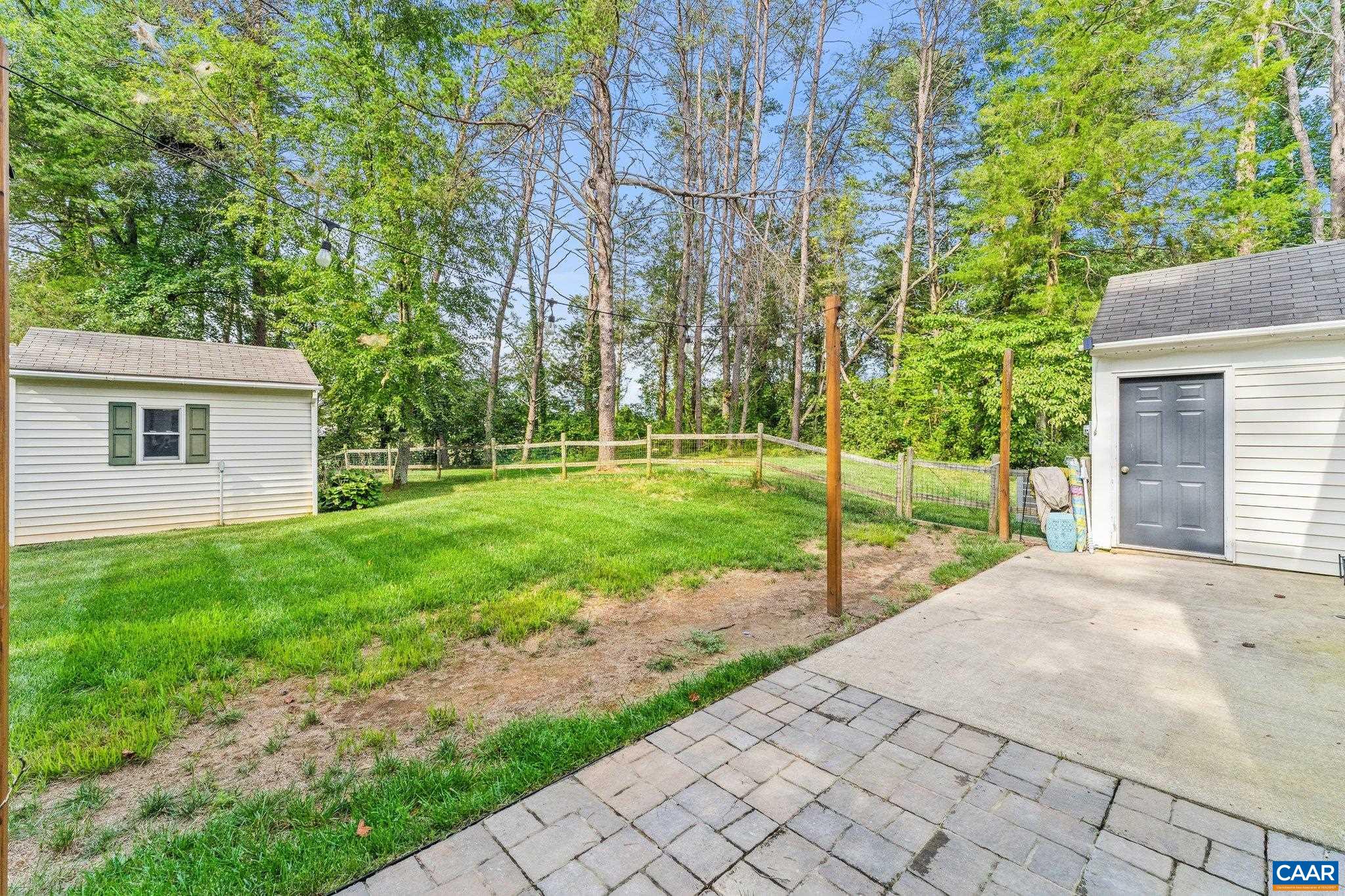 507 Northridge Road Ruckersville, VA 22968 - Photo 40 of 48 a view of a house with backyard and a garden