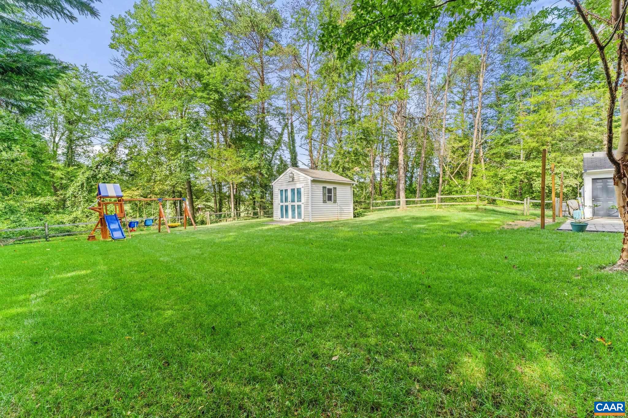 507 Northridge Road Ruckersville, VA 22968 - Photo 48 of 48 a house view with a play ground in front of it