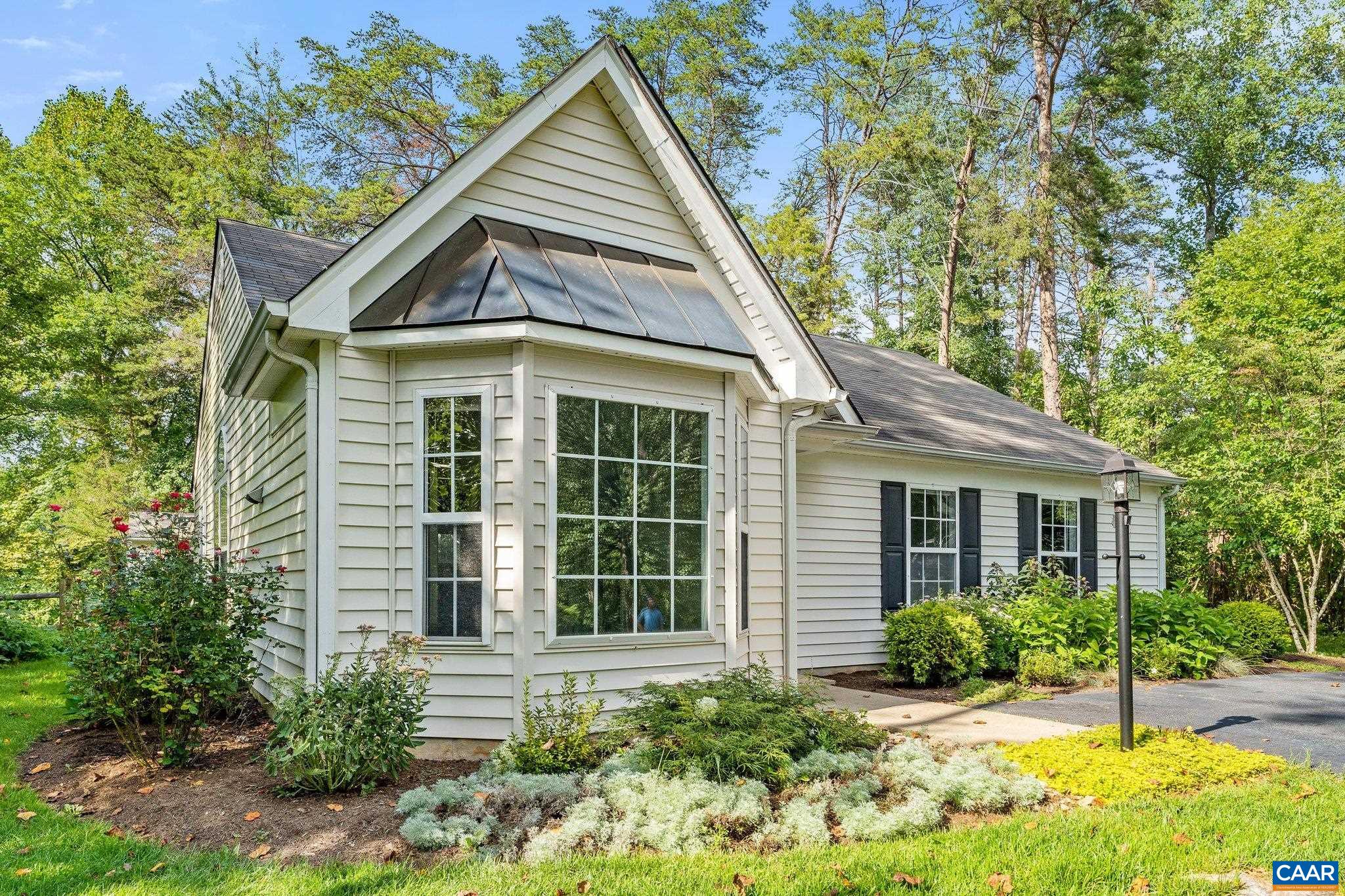 507 Northridge Road Ruckersville, VA 22968 - Photo 5 of 48 a view of a house with yard and plants
