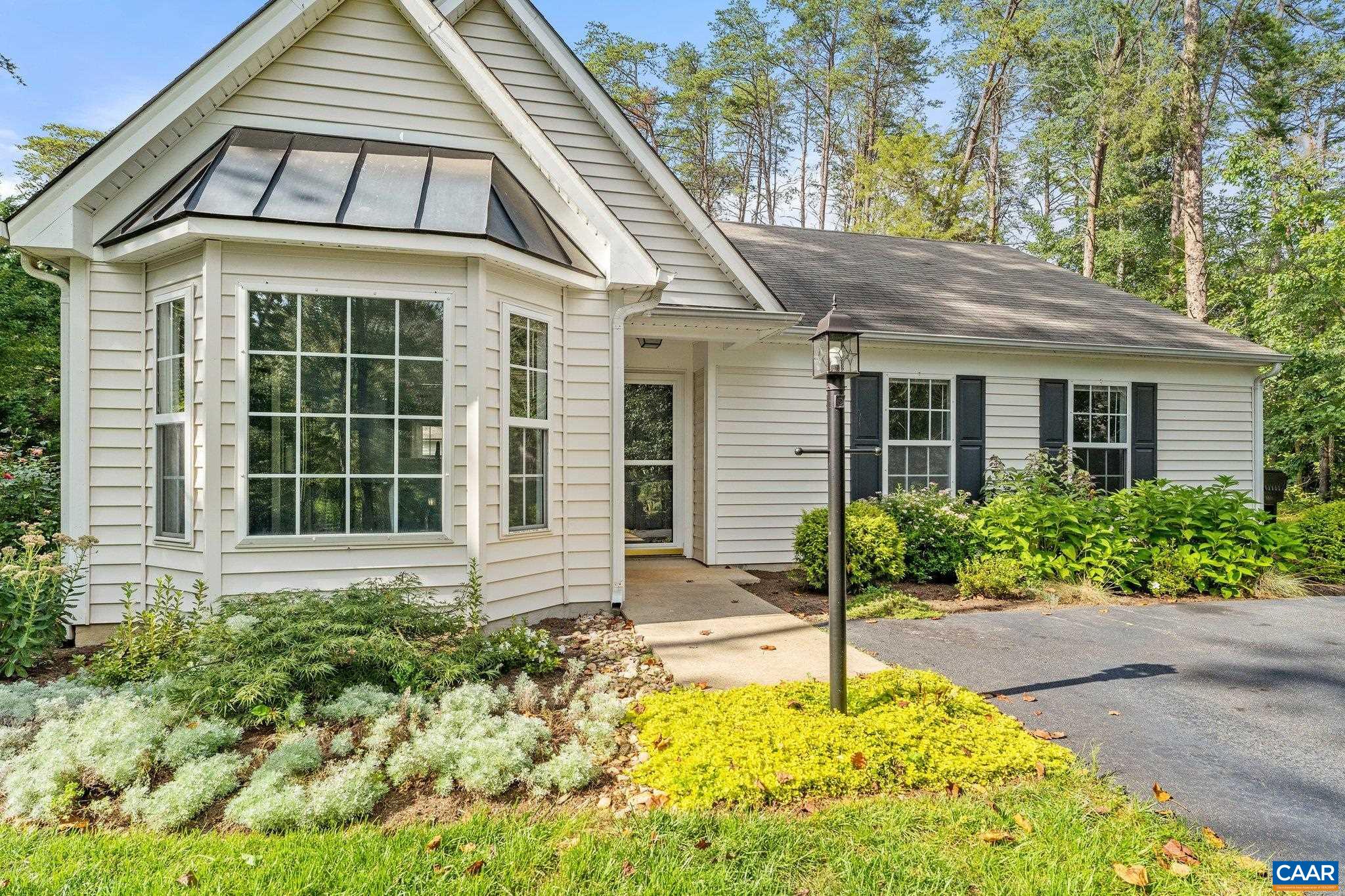 507 Northridge Road Ruckersville, VA 22968 - Photo 6 of 48 a front view of a house with a yard