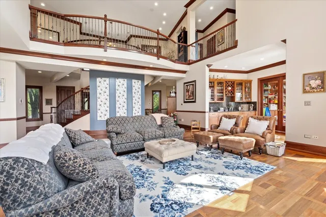 a kitchen with stainless steel appliances kitchen island granite countertop a refrigerator and stove