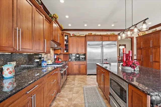 a bathroom with a toilet a sink and a mirror