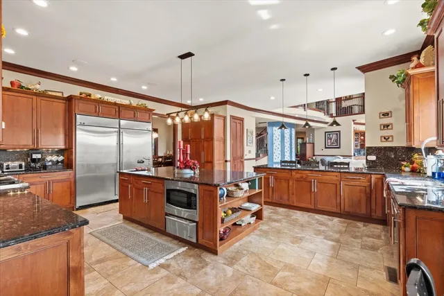 a view of entryway livingroom and hall with wooden floor