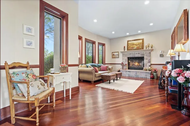 a bed room with a bed mirror and a television