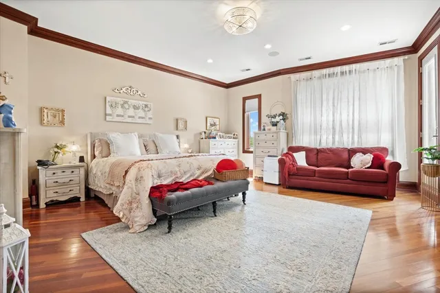 a utility room with dryer washer and a view of living room