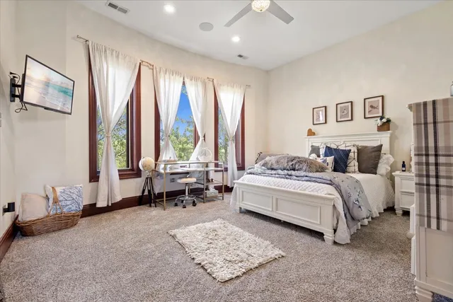 a view of a swimming pool with a yard