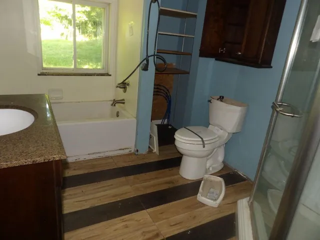 a bathroom with a sink and a toilet