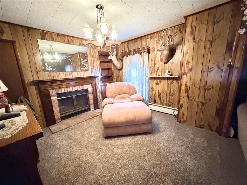 1648 Butler Pike Mercer, PA 16137 - Photo 16 of 25 a living room with furniture and a flat screen tv