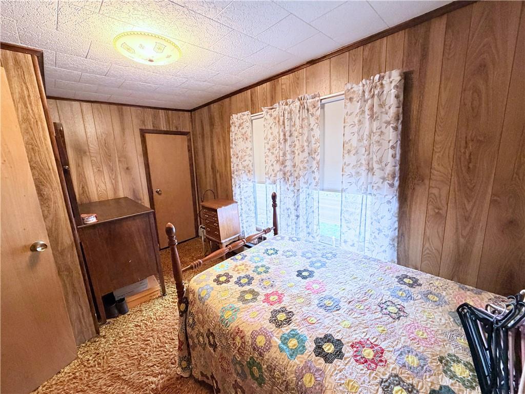 1648 Butler Pike Mercer, PA 16137 - Photo 22 of 25 a bedroom with a bed and a window