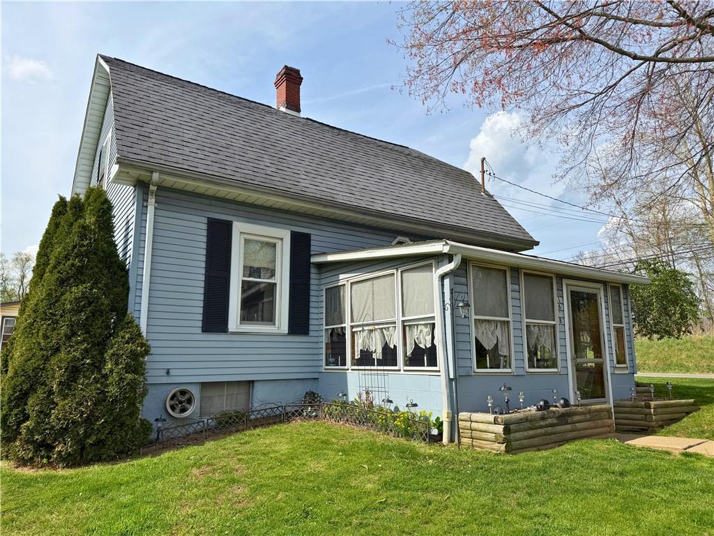1648 Butler Pike Mercer, PA 16137 - Photo 3 of 25 a view of front of a house with a yard
