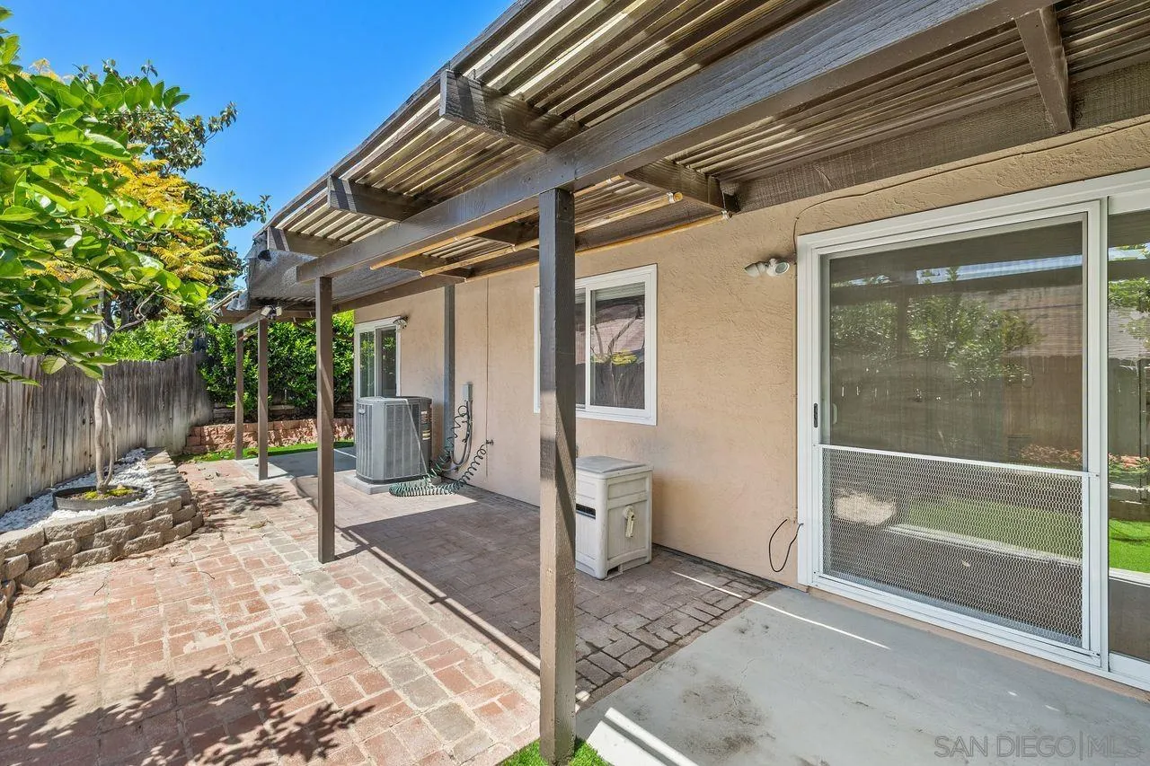 14215 Sutter Mill Way Poway, CA 92064 - Photo 23 of 38 a view of a house with backyard and sitting area