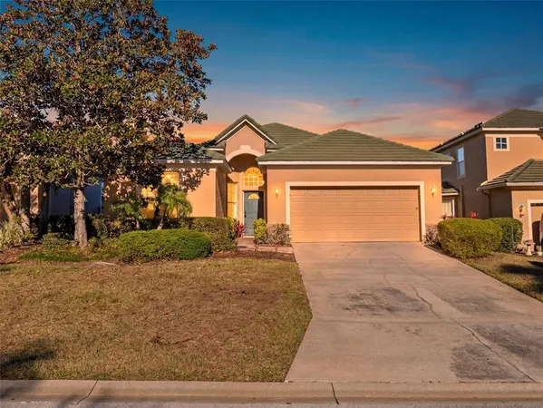 a front view of a house with yard