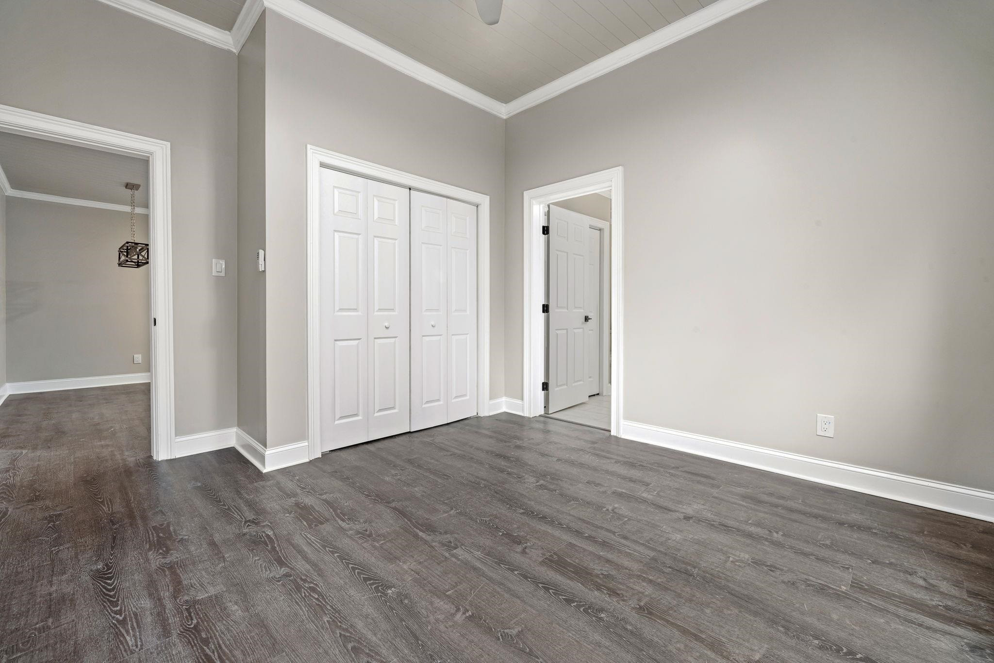 1716 Chapel Hill Road Durham, NC 27707 - Photo 23 of 33 a view of an empty room with wooden floor