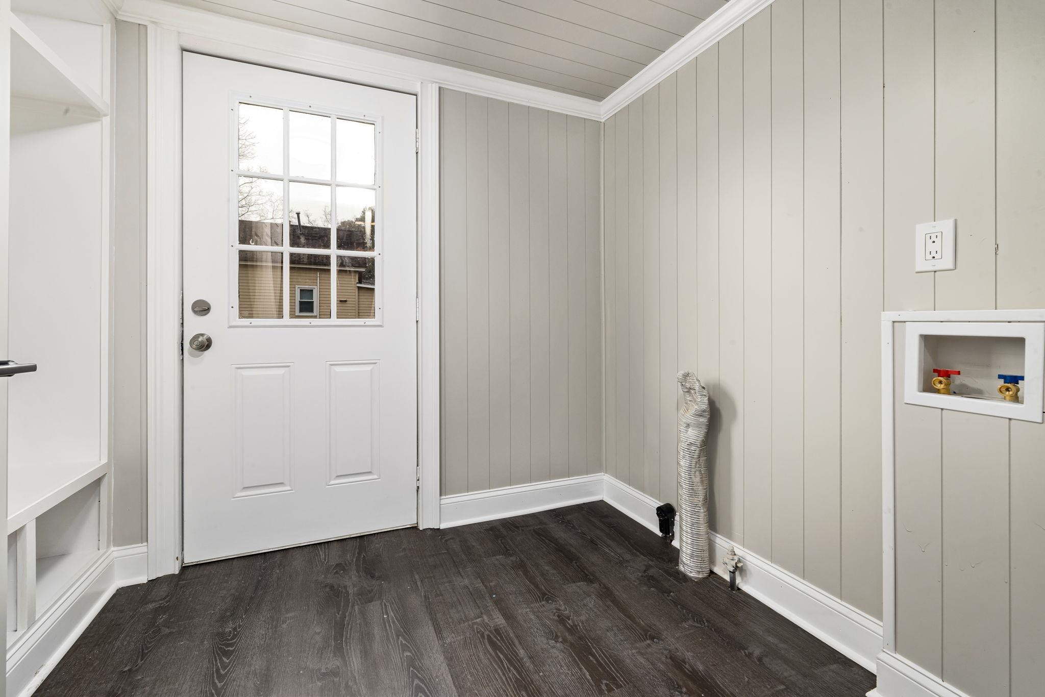 1716 Chapel Hill Road Durham, NC 27707 - Photo 29 of 33 an empty room with wooden floor and windows