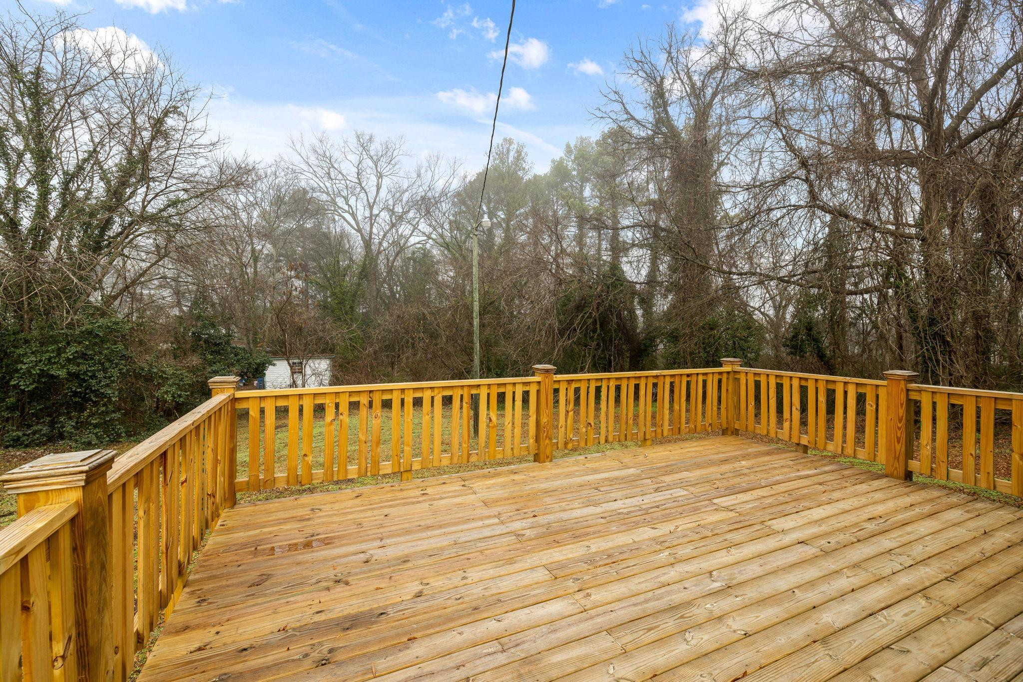 1716 Chapel Hill Road Durham, NC 27707 - Photo 32 of 33 a view of balcony with wooden floor and fence