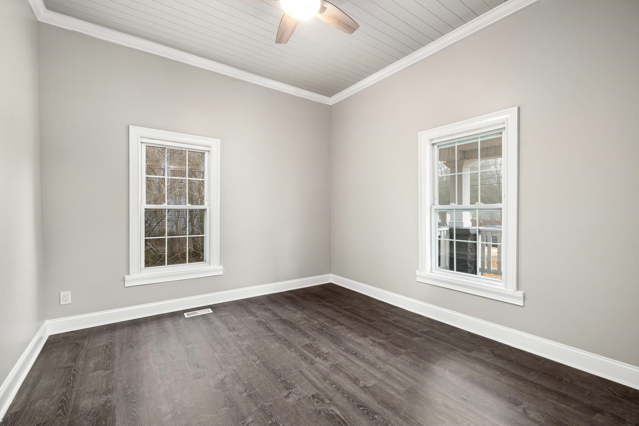 1716 Chapel Hill Road Durham, NC 27707 - Photo 8 of 33 a view of an empty room with wooden floor and a window