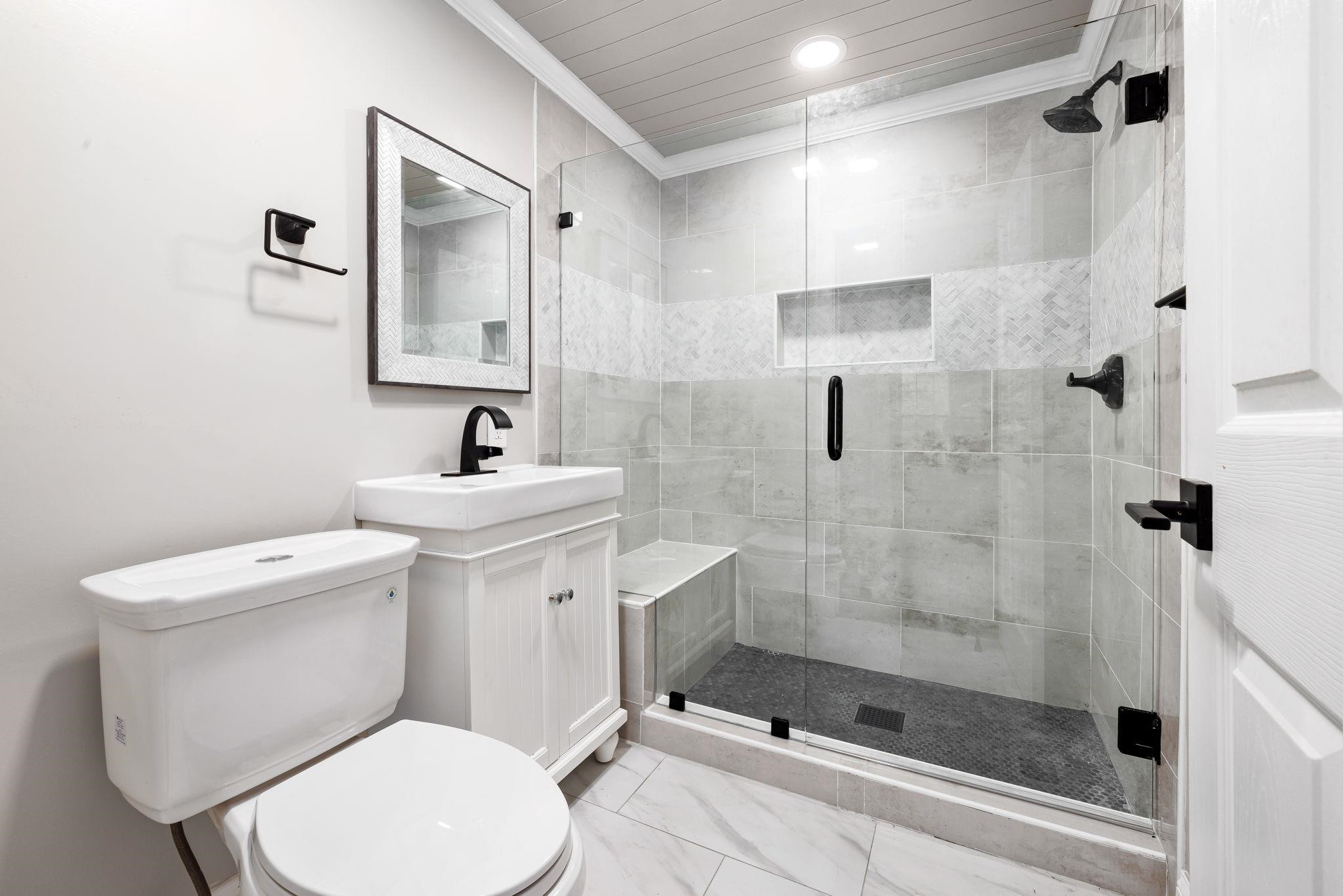 1716 Chapel Hill Road Durham, NC 27707 - Photo 10 of 33 a bathroom with a toilet sink and shower