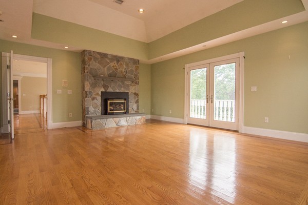 68 Coppermine Road Topsfield, MA 01983 - Photo 12 of 30 a view of an empty room with a fireplace and a window