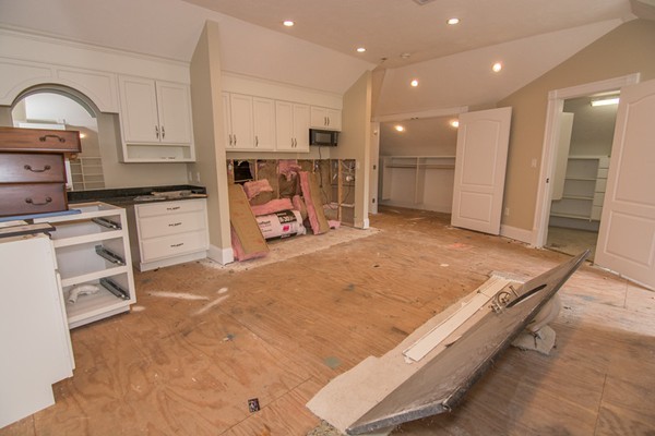 68 Coppermine Road Topsfield, MA 01983 - Photo 16 of 30 a large kitchen with stainless steel appliances granite countertop a stove a sink and a refrigerator