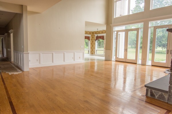 68 Coppermine Road Topsfield, MA 01983 - Photo 17 of 30 a view of an empty room with wooden floor and a window