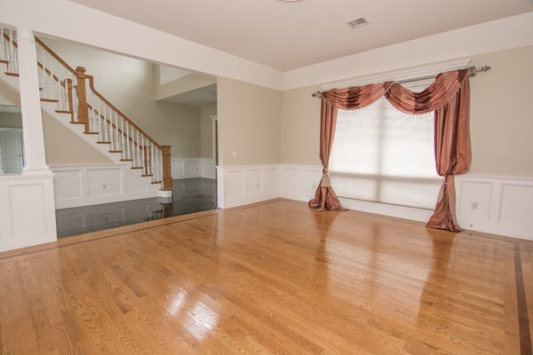 68 Coppermine Road Topsfield, MA 01983 - Photo 26 of 30 a view of an empty room with wooden floor and a window