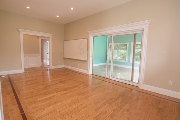 68 Coppermine Road Topsfield, MA 01983 - Photo 28 of 30 an empty room with wooden floor and windows