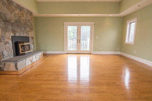 68 Coppermine Road Topsfield, MA 01983 - Photo 29 of 30 a view of an empty room with window and wooden floor