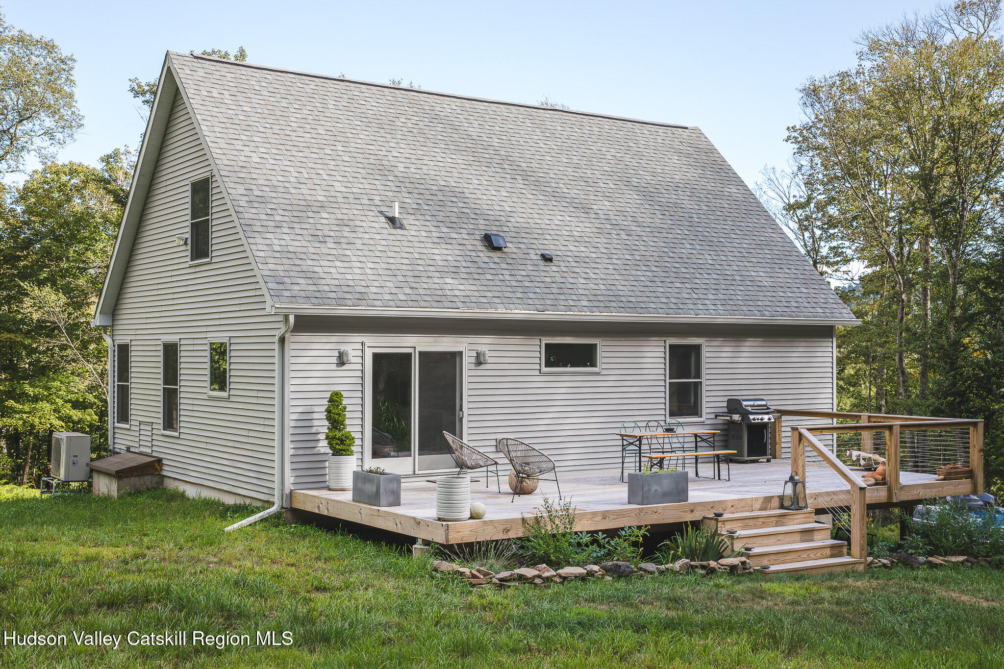 546 Willowemoc Road Livingston Manor, NY 12758 - Photo 1 of 30 a front view of house with a garden and deck