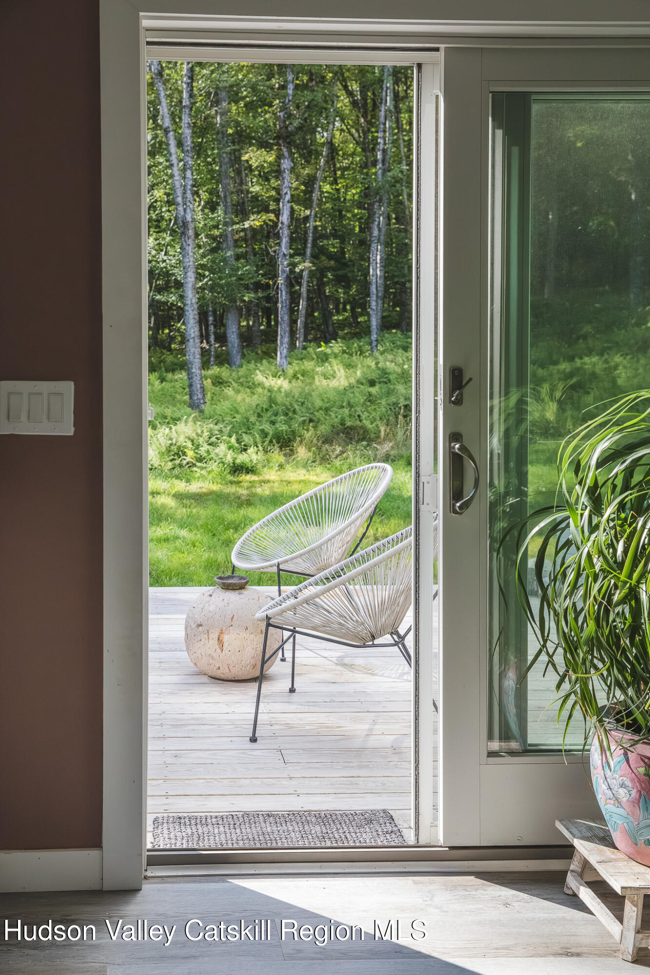 546 Willowemoc Road Livingston Manor, NY 12758 - Photo 12 of 30 a view of a porch with a floor to ceiling window