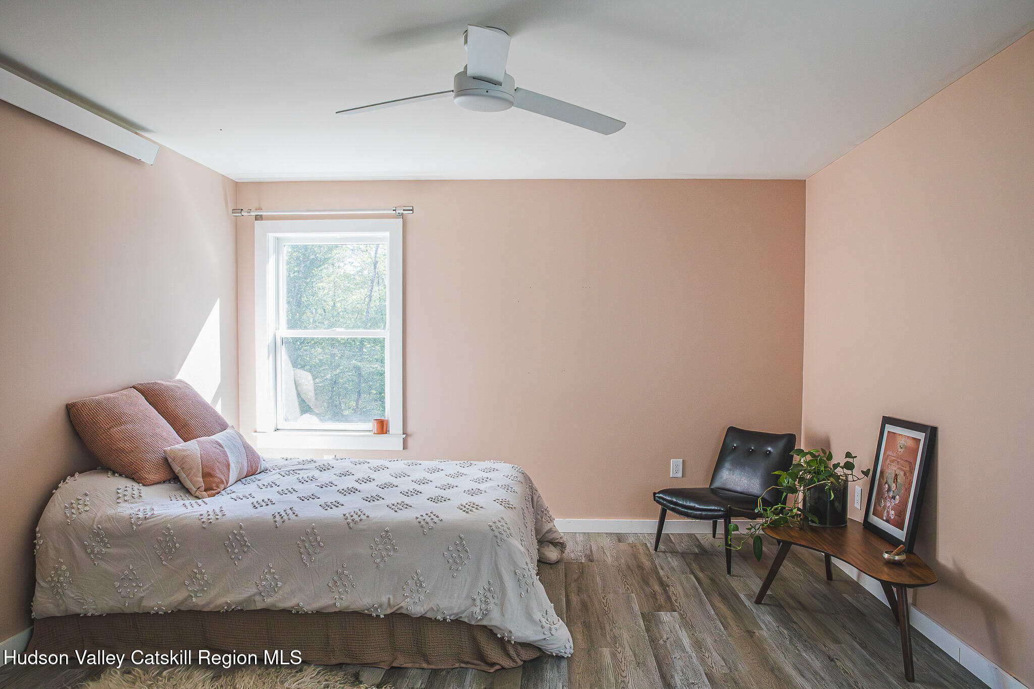 546 Willowemoc Road Livingston Manor, NY 12758 - Photo 14 of 30 a bedroom with a bed and a table