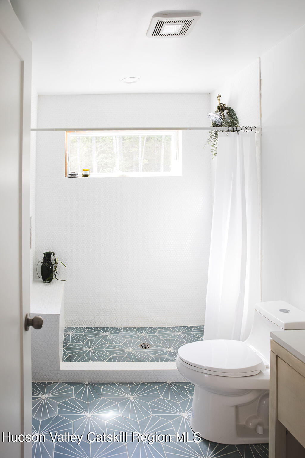 546 Willowemoc Road Livingston Manor, NY 12758 - Photo 18 of 30 a bathroom with a toilet a sink and shower