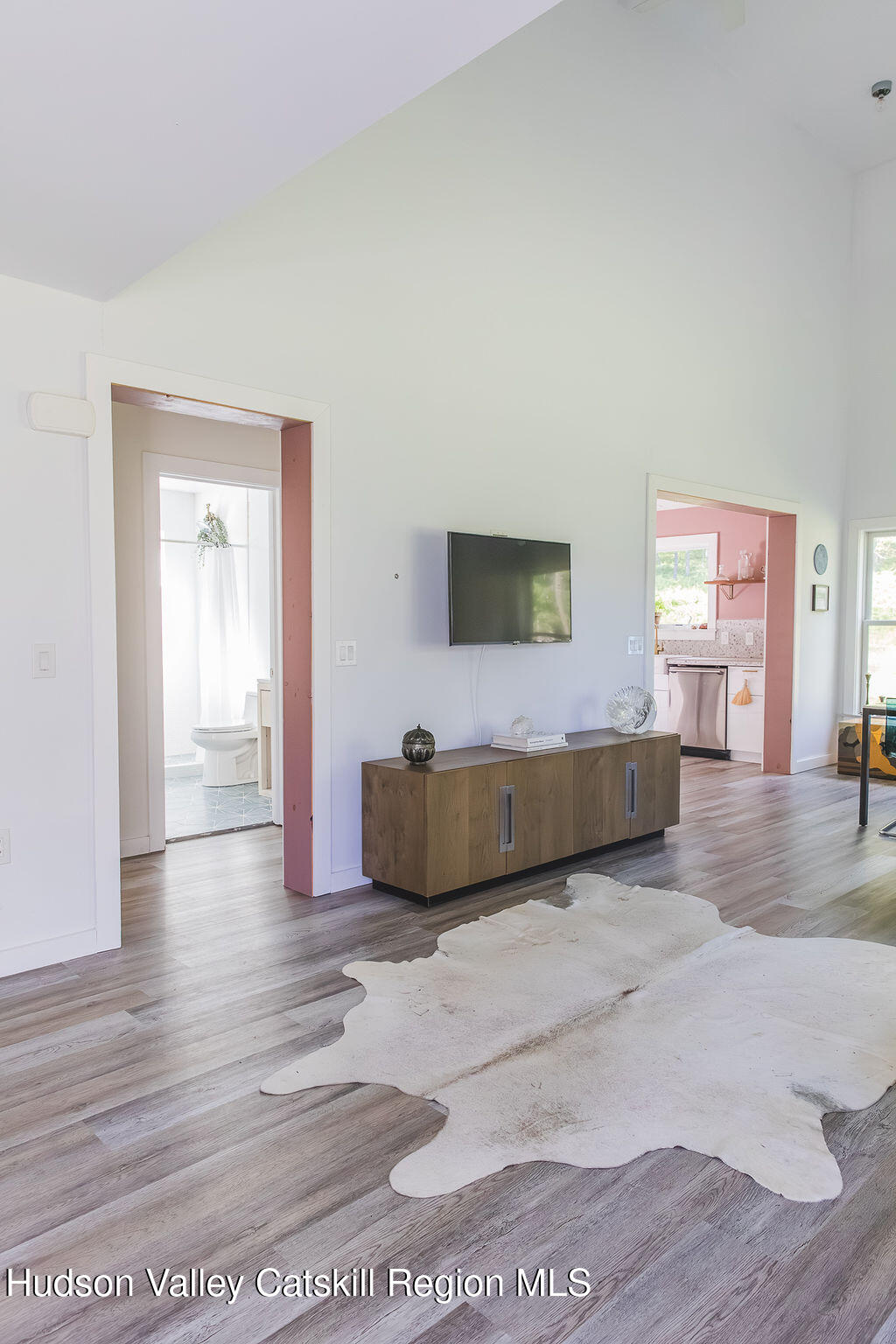 546 Willowemoc Road Livingston Manor, NY 12758 - Photo 5 of 30 a living room with furniture and a wooden floor