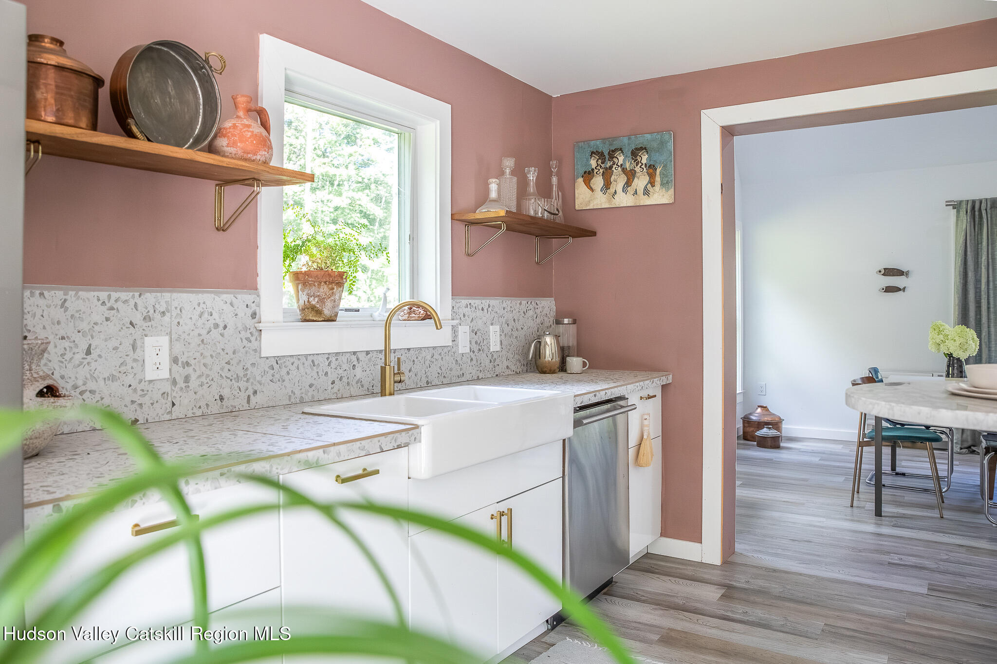 546 Willowemoc Road Livingston Manor, NY 12758 - Photo 10 of 30 a kitchen with a sink cabinets and window