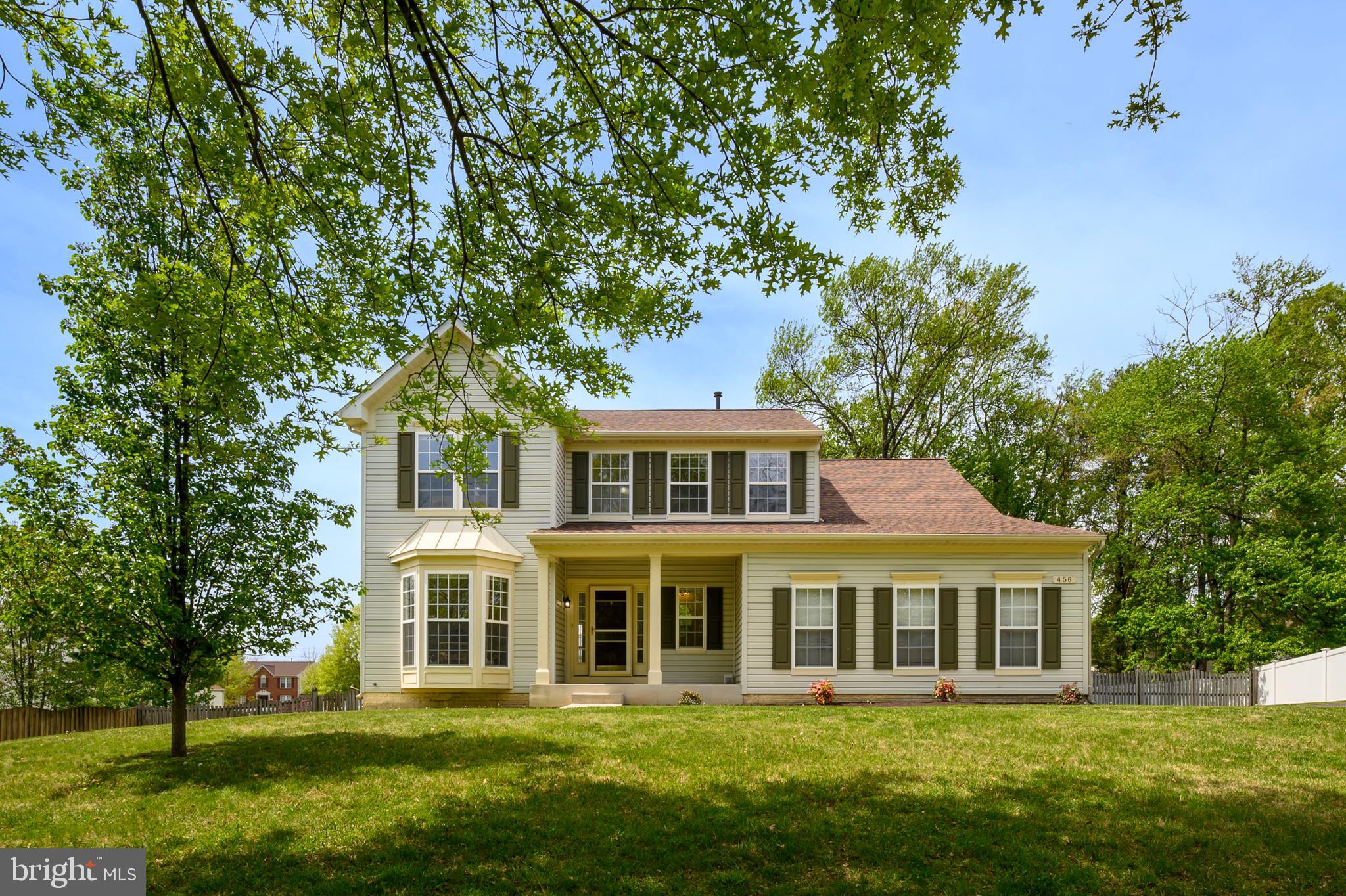 456 North Patuxent Road Odenton, MD 21113 - Photo 1 of 44 a front view of a house with a garden