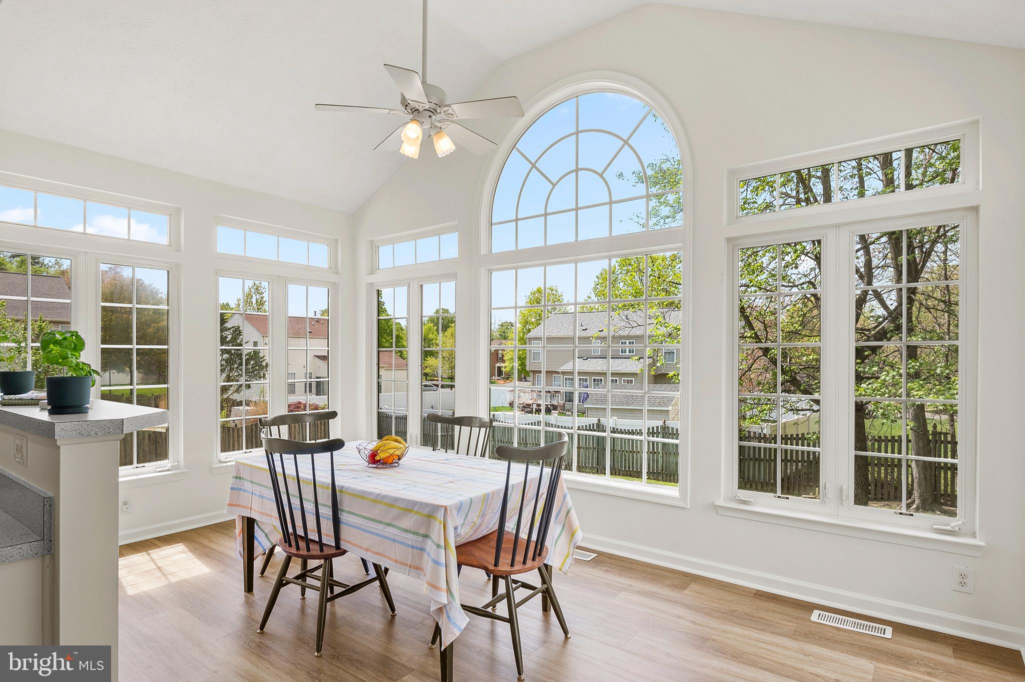 456 North Patuxent Road Odenton, MD 21113 - Photo 12 of 44 a dining room with furniture a chandelier and wooden floor